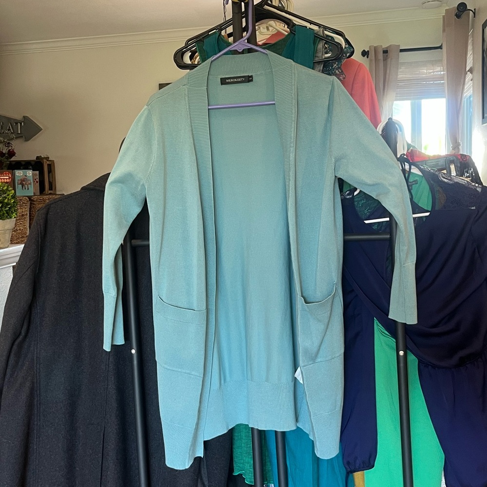 Merokitty Women's turquoise Sweater